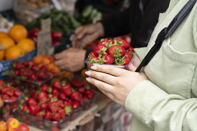 close-up-hands-holding-strawberries.jpg