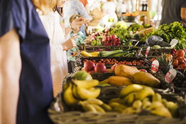 people-buying-vegetable-stall-market.jpg