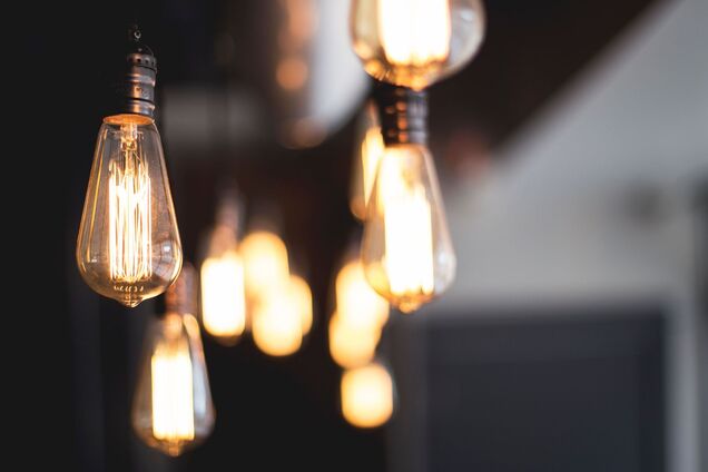 wide-selective-closeup-shot-illuminated-light-bulbs-hanging-from-ceili.jpg